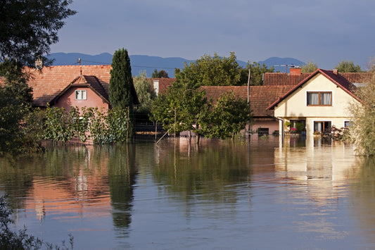flooded house with water reaching the second floor which is a safety hazard