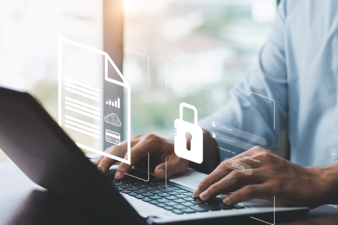 man using computer with an overlay of cyber security